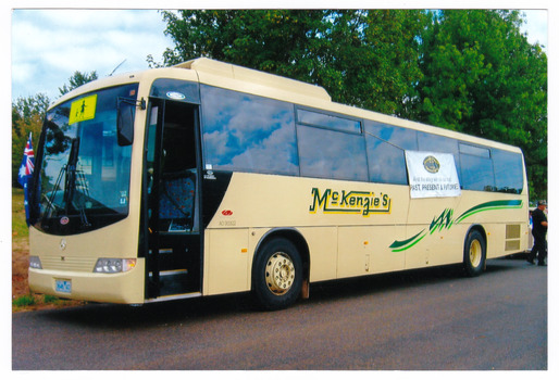A colour photograph of a McKenzie's bus. McKenzie's Tourist Services were associated with the growth of Marysville as a tourist destination.