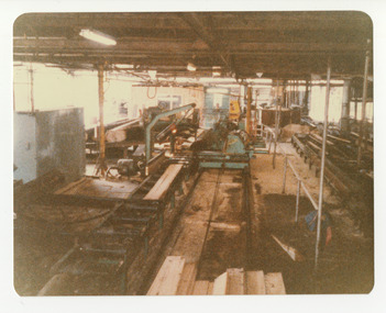 A colour photograph taken at Sunds Bros Sawmill in Marysville. Sund's Sawmill (historically operated by Arthur & John Sund and often referenced locally as Sund Stenco) was a prominent mid-century timber mill located in Marysville, Victoria. It played a central role in the region's booming post-war logging era. 