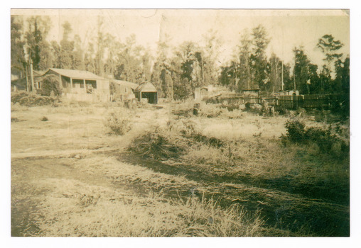 A copy of a black and white photograph taken at Andersons No. 1 Mill of some of the mill workers' houses.
