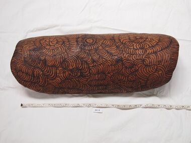 Coolamon Dish, This item is made by taking bark from the tree, soaking it to make it pliable then shaping into a curve then direid slowly over heat to set the shape