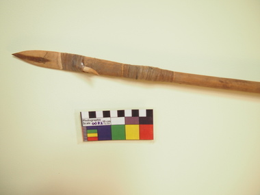 barbed wooden spear with angled tail extension