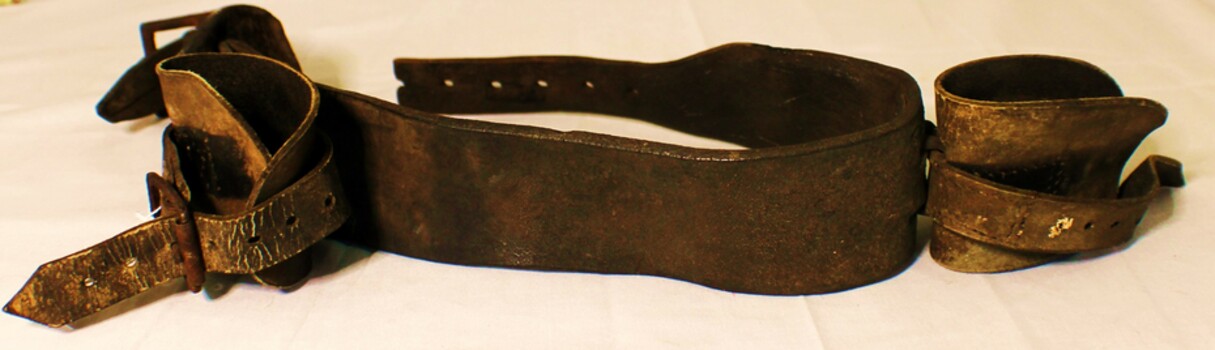 Patient restraint belt made of leather with metal buckles
