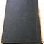 Back cover - publisher’s original navy blue pebbled-finished cloth