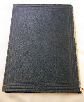 Back cover - publisher’s original navy blue pebbled-finished cloth