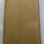 Back cover - Tan in colour, fair condition, slightly dog-eared, worn from use.