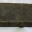 Spine and front cover. Spine has tearing and stains from use. 