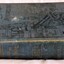 Spine and front cover -  hardcover cloth binding with black and gold lettering and decoration and Strand street scene on front board