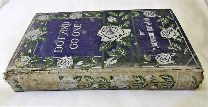 Gilt lettering on spine, ends are worn and book title also worn away.