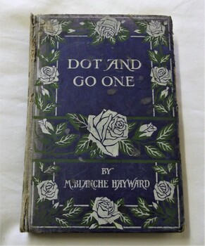 Blue paperboard cover with stencilled flowers and leaves 