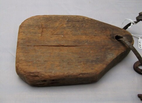 Closer view of wooden tag attached to Gaol key