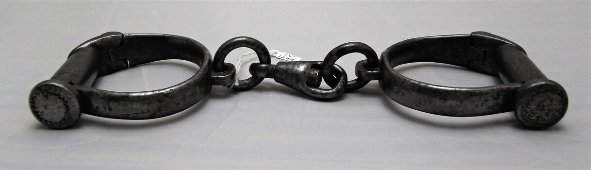  Side view of small handcuffs 