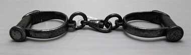  Side view of small handcuffs 