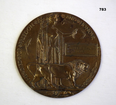Bronze memorial plaque to families