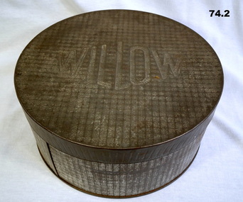 Round Willow cake tin used for food parcels