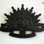 Blackened Rising Sun hat badge WW2