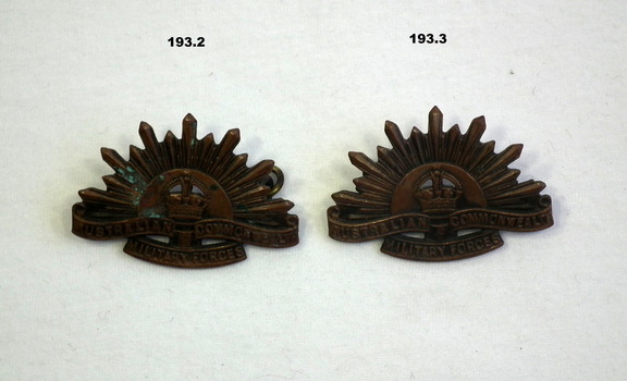 blackened rising sun collar badges. WW2