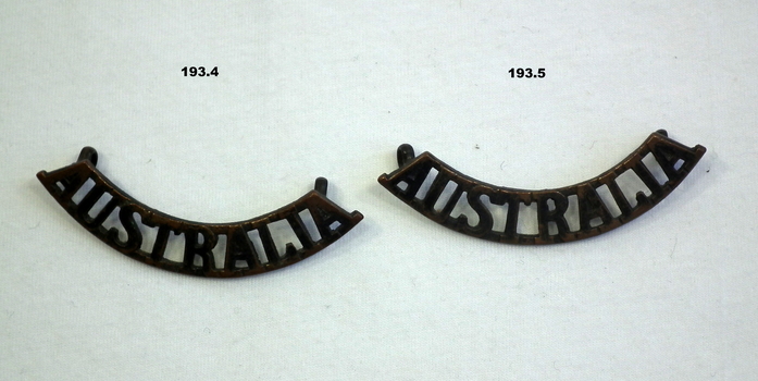 Blackened Australia shoulder uniform badges WW2