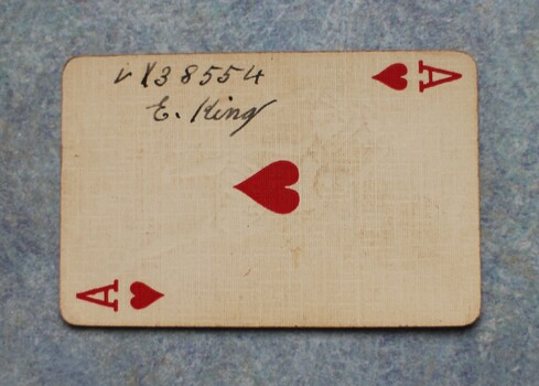 Ace of hearts card signed by a soldier