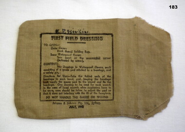 Calico cover from a first field dressing.