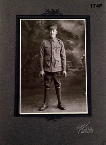 Black and white photo of a soldier on backing
