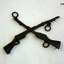 Metal pair  of crossed rifles for clothing