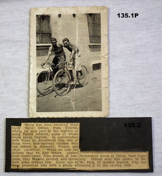 Photograph and text of two Italian bike riders