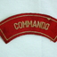 Red curved Commando shoulder patch