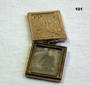 Small gold locket with photo of RAAF airman