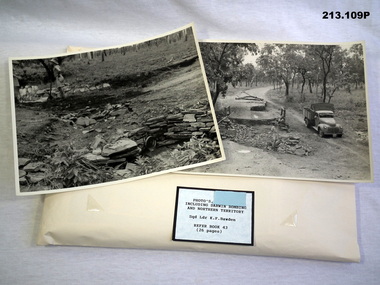 Khaki folder with B & W photos from the NT WW2