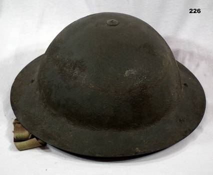Steel British pattern tin hat with chin strap
