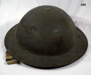 Steel British pattern tin hat with chin strap