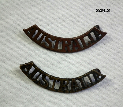 Blackened Australia shoulder badges WW2