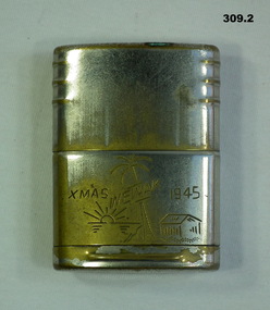Engraved cigarette lighter dated 1945