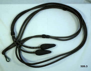 Lanyard attachment for sword and scabbard