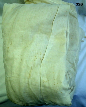 White cotton mosquito net with attachments
