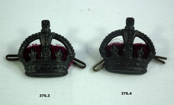 Blackened uniform shoulder rank badges