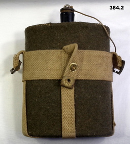 Water bottle with cover and webbing holder