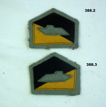 Two Australian Armoured Corp felt badges