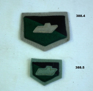 two Australian Armoured Corp badges