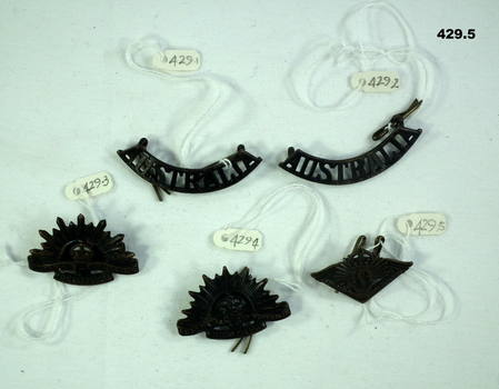 Uniform and service badges relating to WW2