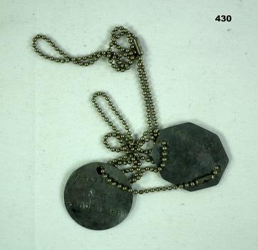 Metal identification discs for Frederick Addlem WW2