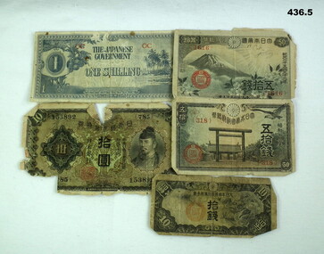 Various currency notes of Japanese origin.