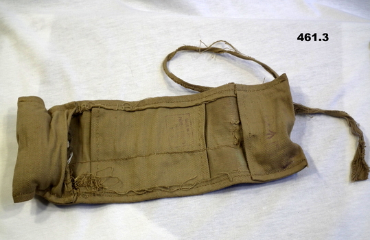 Khaki sewing kit with contents