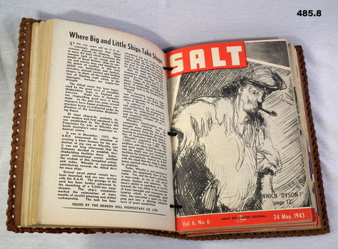Salt magazine open in leather bound cover