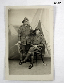 B & W photo of two soldiers in studio.