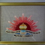 Framed embroidered Rising Sun badge