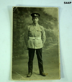 B & W photo showing a soldier in uniform