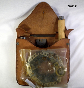 Saw tool kit in a leather case.