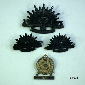 Rising sun and female relative badges