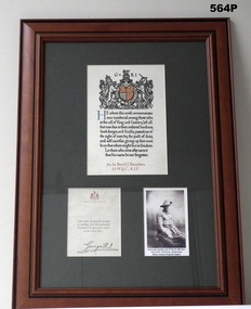 Framed photograph and commemorative scroll WW1